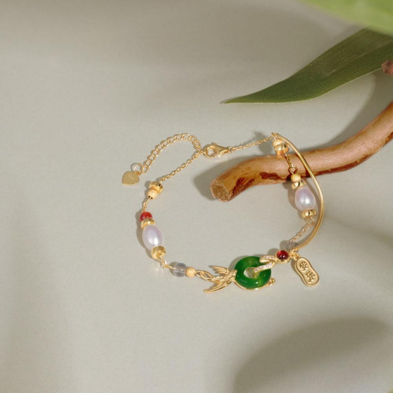 Emerald Circle and Golden Charm Bracelet