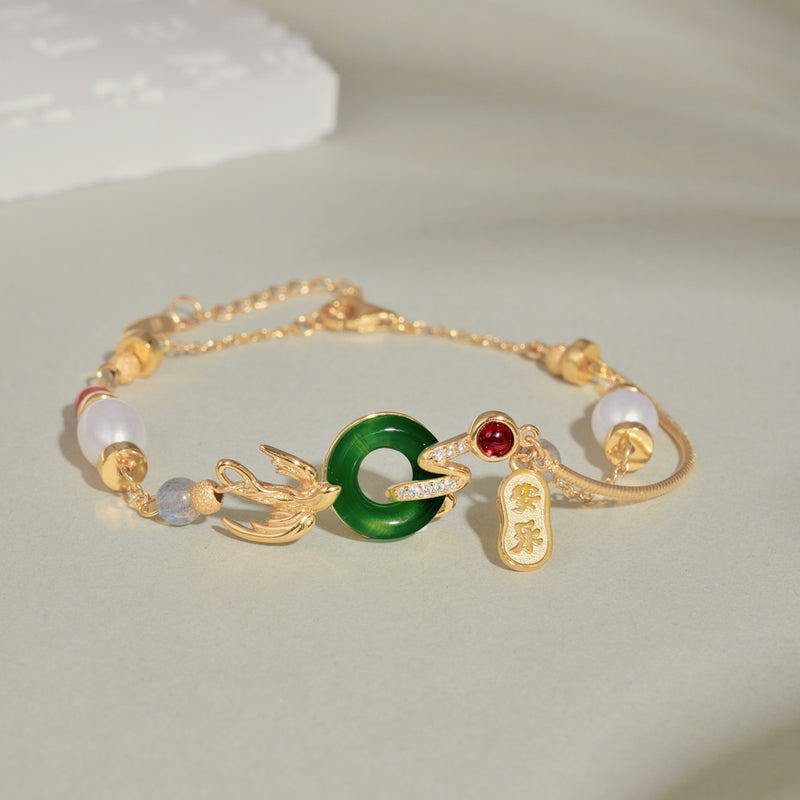 Emerald Circle and Golden Charm Bracelet