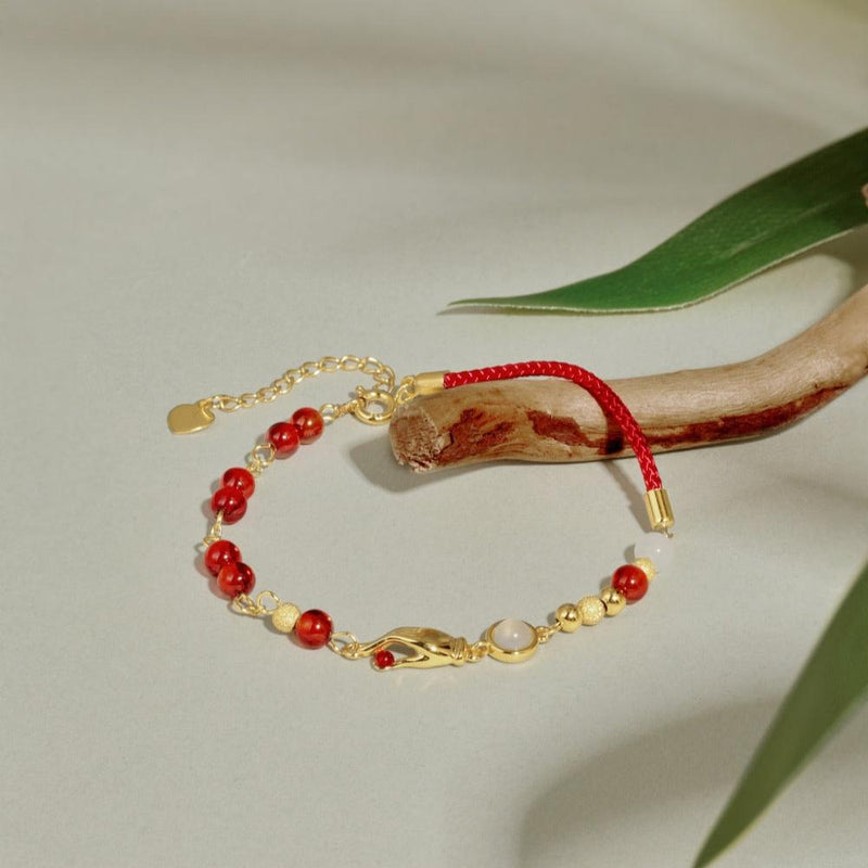 Golden Hand Charm Red Bead Bracelet