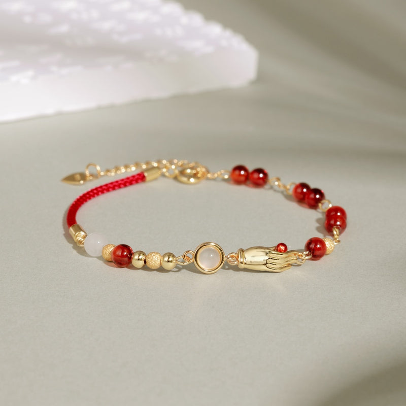 Golden Hand Charm Red Bead Bracelet